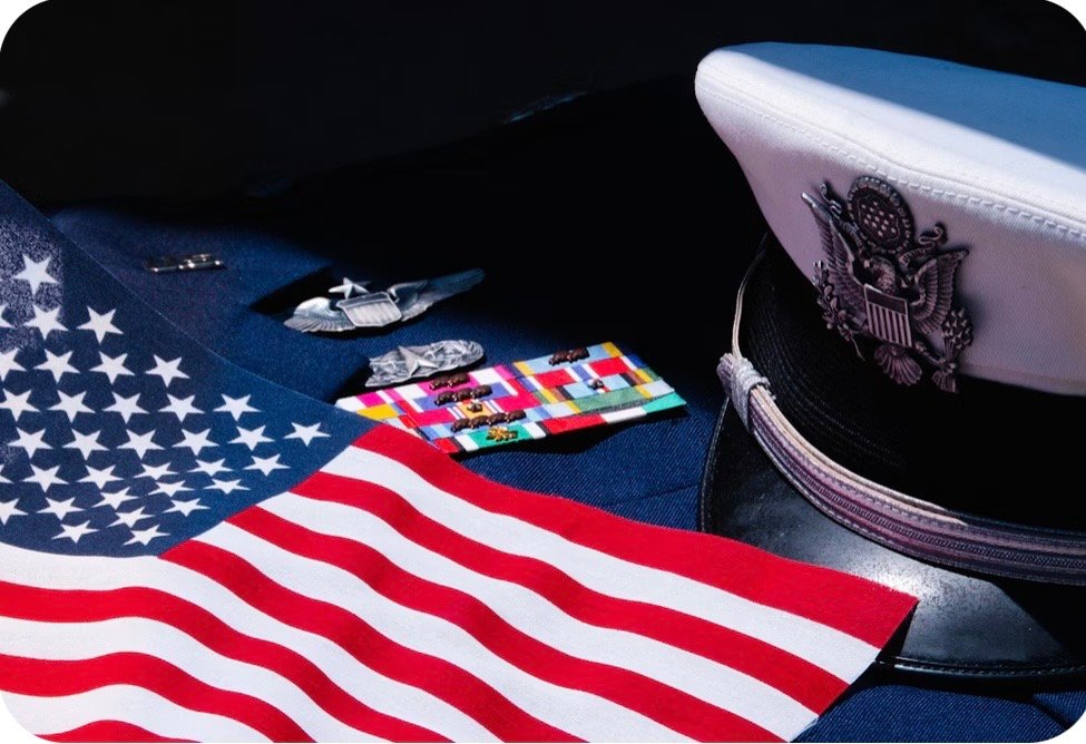 Two people reviewing VA benefits application forms